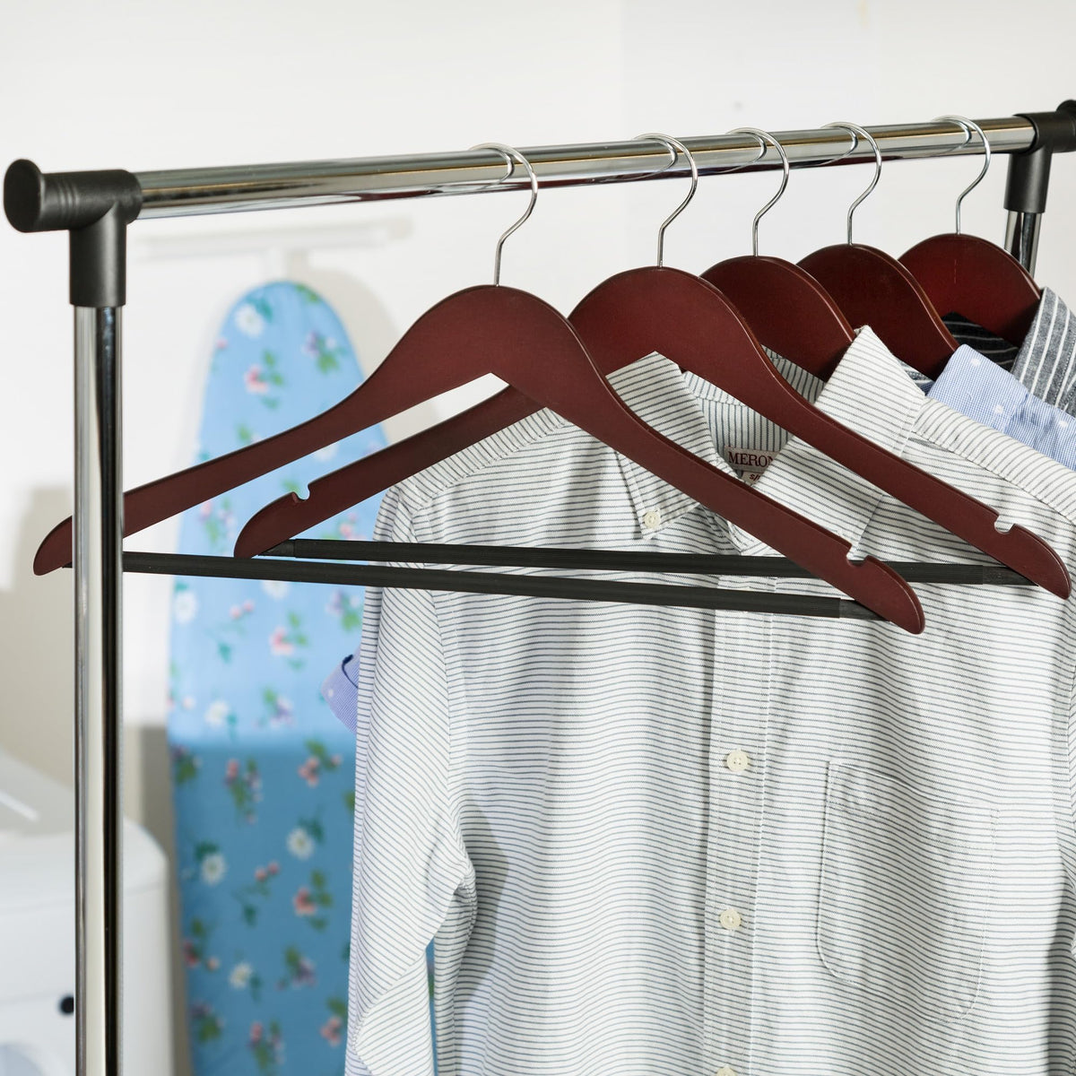 Honey-Can-Do cherry wood hanger features 360° swivel for easy access