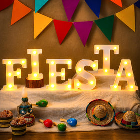 Honoson Fiesta LED Letters Sign on table adding festive glow for gatherings