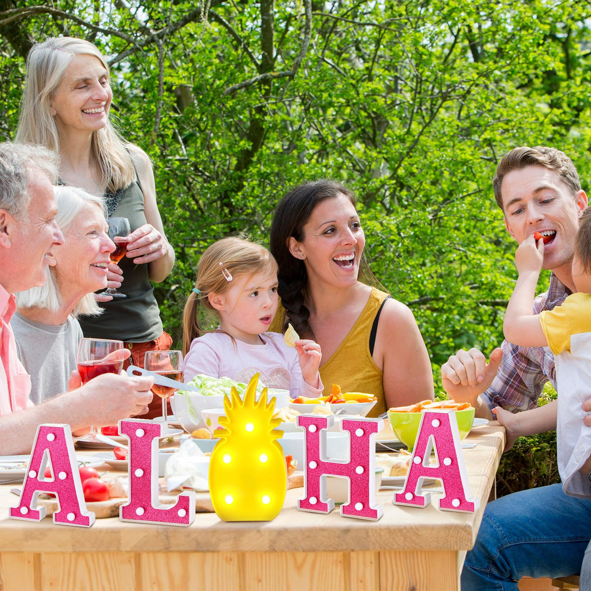 Honoson Aloha lights provide a playful touch for poolside patio decor