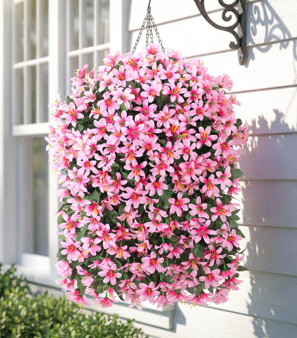 Hoppwodd artificial lily hanging basket in pink adds vibrant, low-maintenance color to porches.