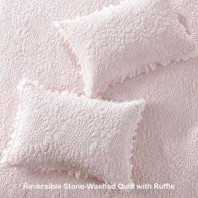 HORIMOTE HOME pink shams with matching ruffles complete the set.