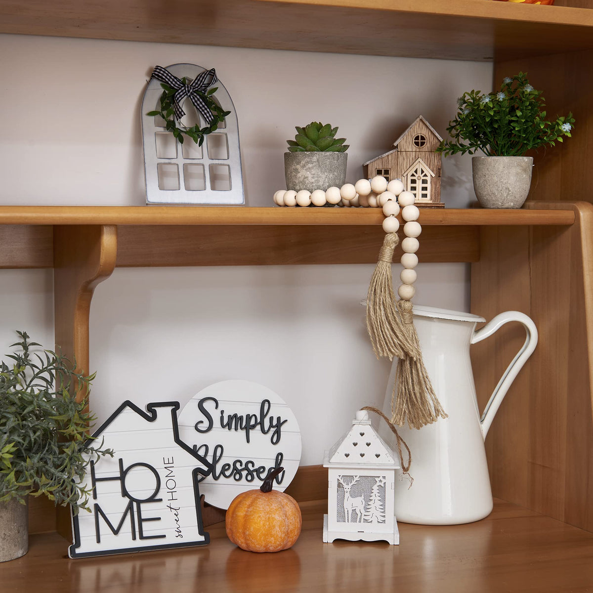Houmury Second easel stand adds height to décor arrangements.