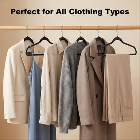 House Day black plastic hangers provide durable support for garments.