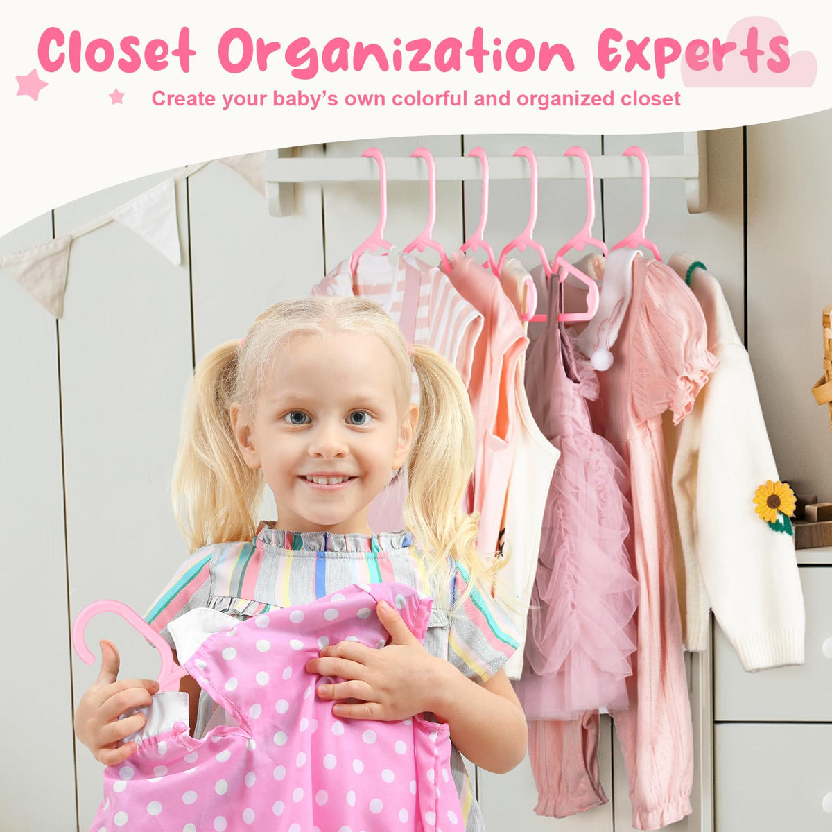 House Day eight-pack pink baby hangers help organize growing clothes.