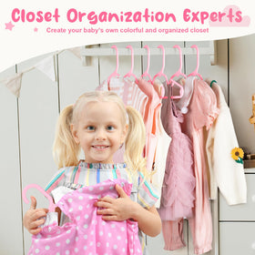 House Day eight-pack pink baby hangers help organize growing clothes.