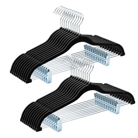 House Day velvet hanger with adjustable clips holding a complete outfit for quick dressing.
