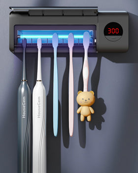 HouseGem toothbrush holder with timer wall-mounted on black finish, keeping brushes organized.