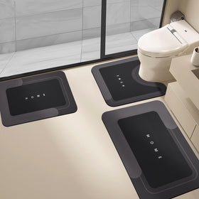 Housego 3-piece absorbent bath mat set with diatomite surface for fast water absorption.
