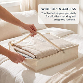 Three-sided zipper allows easy loading and retrieval for sweaters and linens.