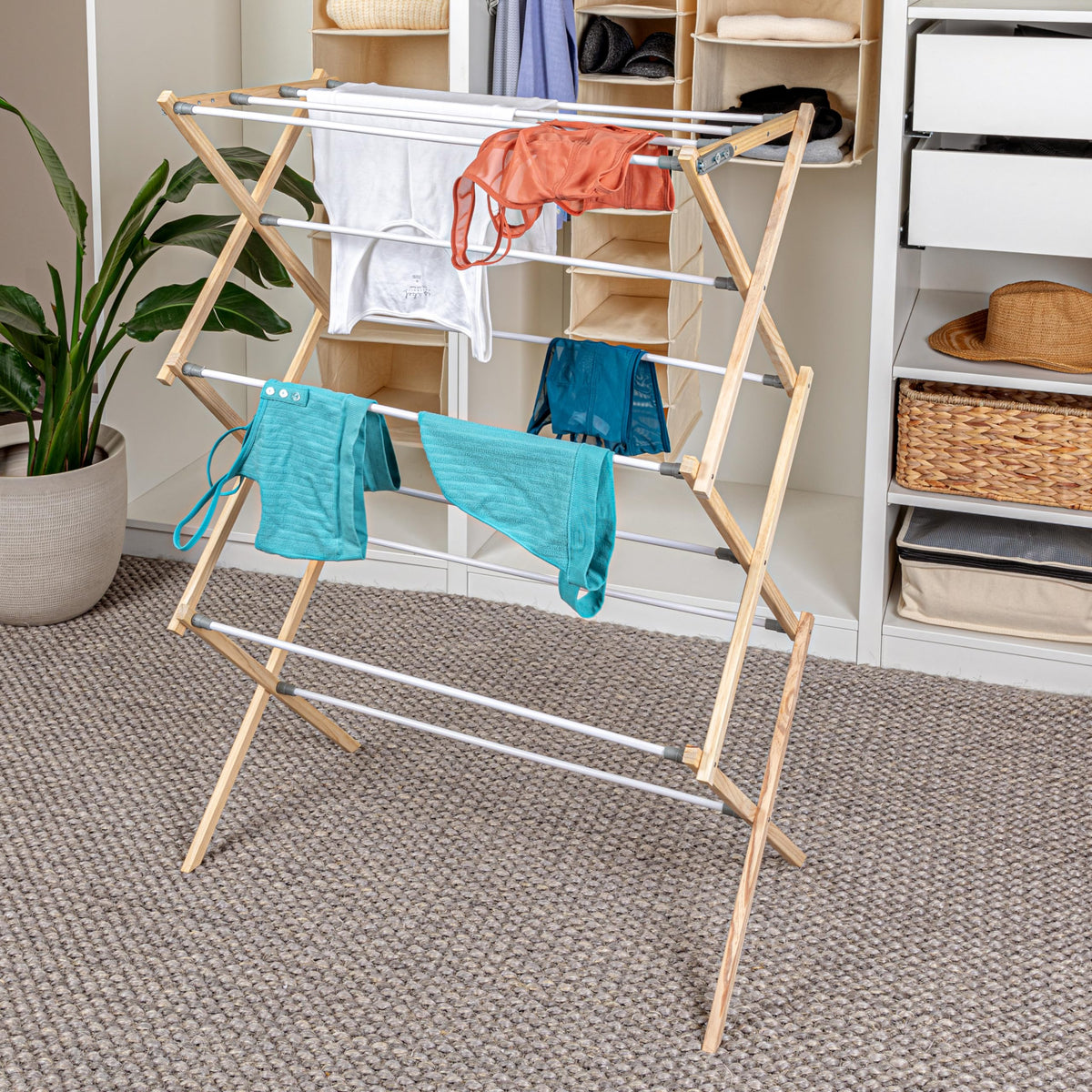 Household Essentials X-Frame drying rack features vinyl-wrapped rods to minimize fabric snagging