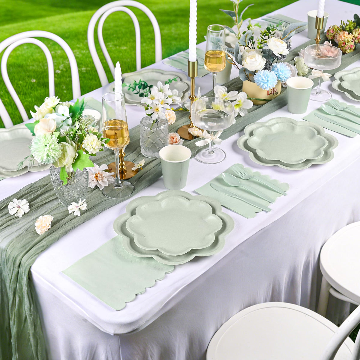 Houuqe sage green party set table setup with coordinated tableware.