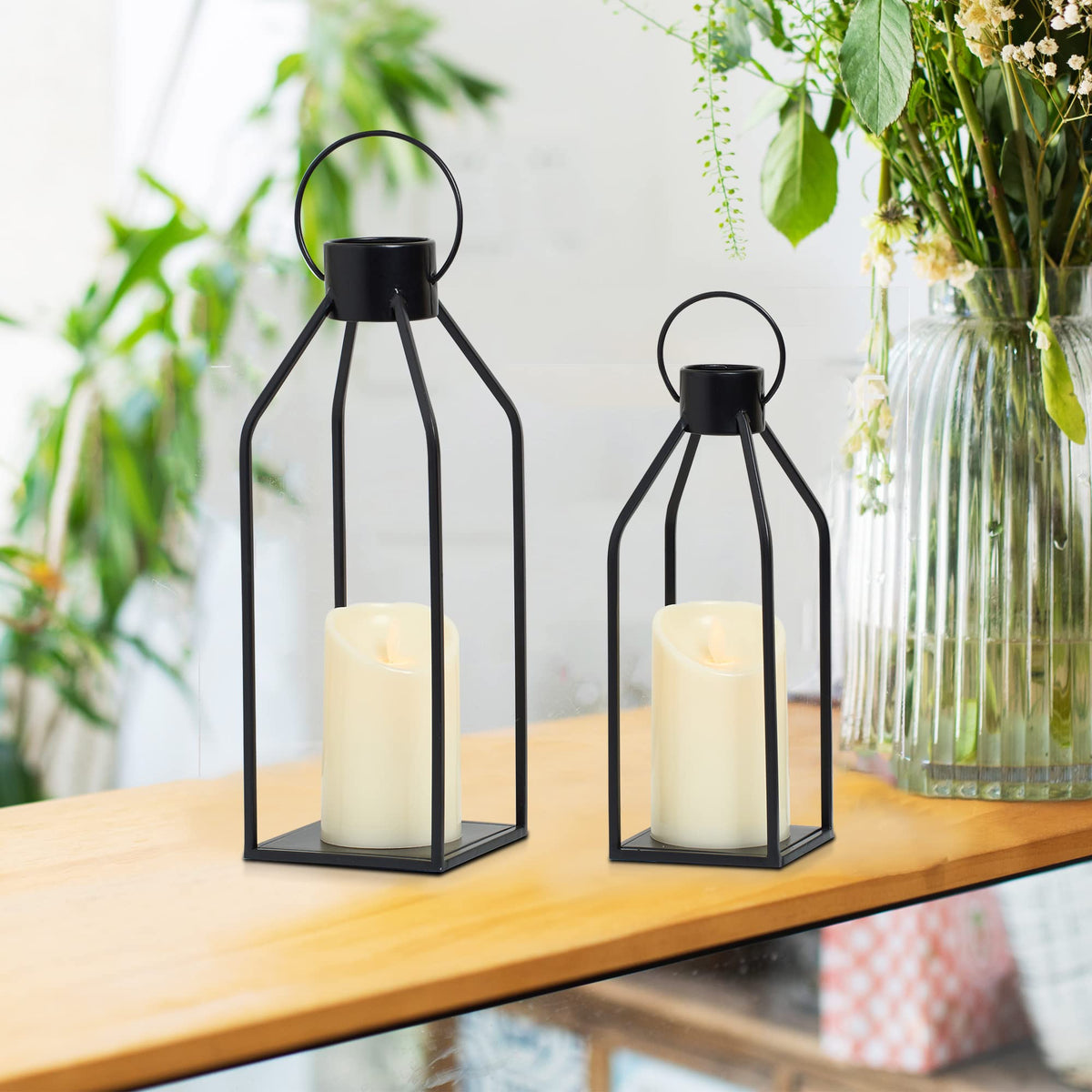 HPC Decor lantern on fireplace mantle adds warm flicker for cozy evenings.