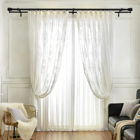 Hradecti layered-curtain look showcasing sheer and blackout options.