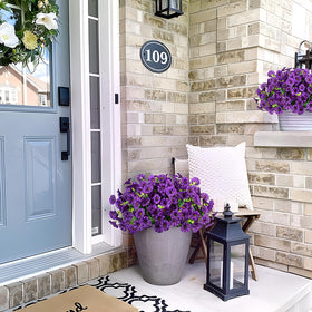 Hrobek front-door bouquet setup showing easy maintenance and evergreen color.