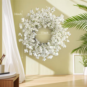 Huashen front door wreath with forsythia blooms for a welcoming entry.