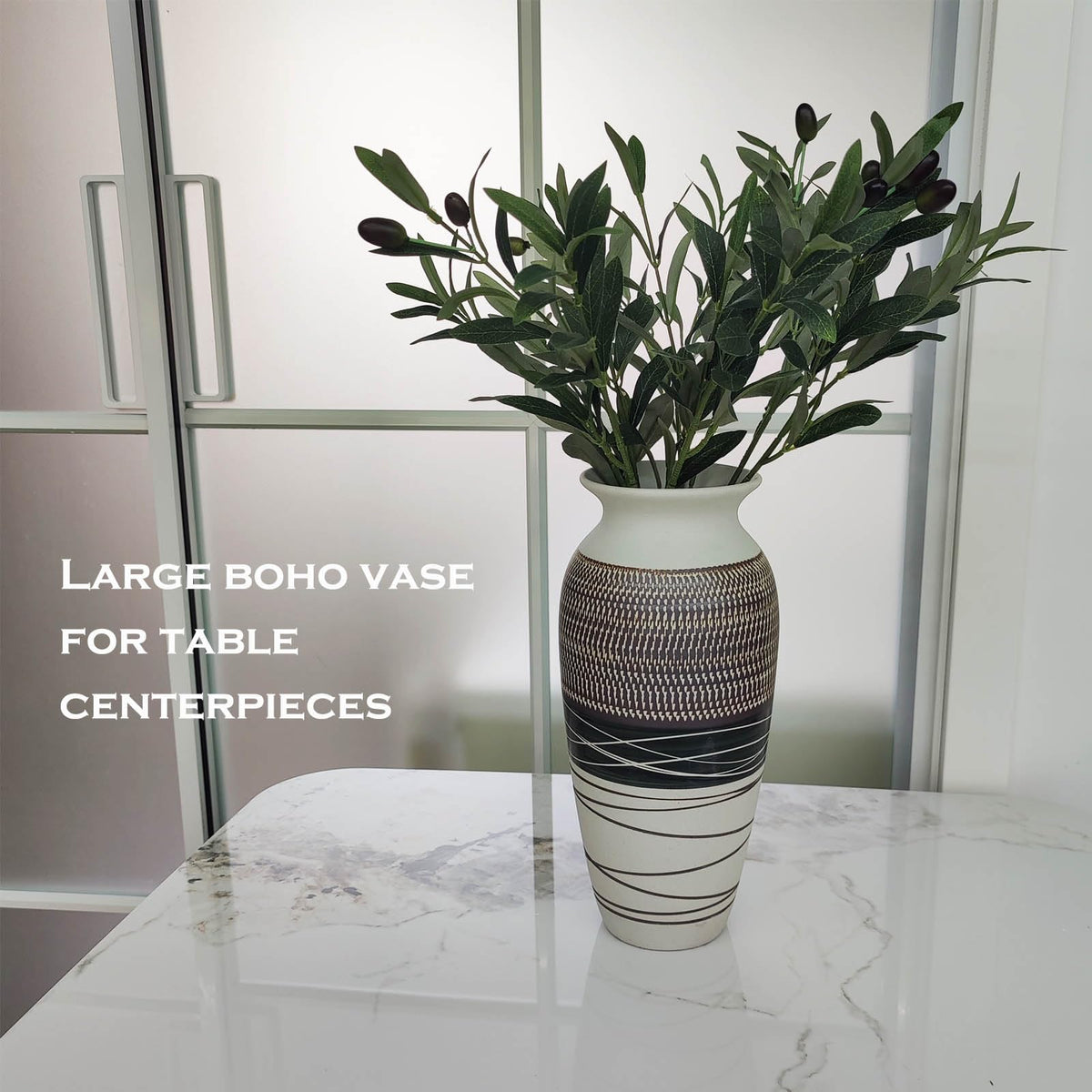 HUBUISH water-tight vase ready for fresh flowers or dried stems.