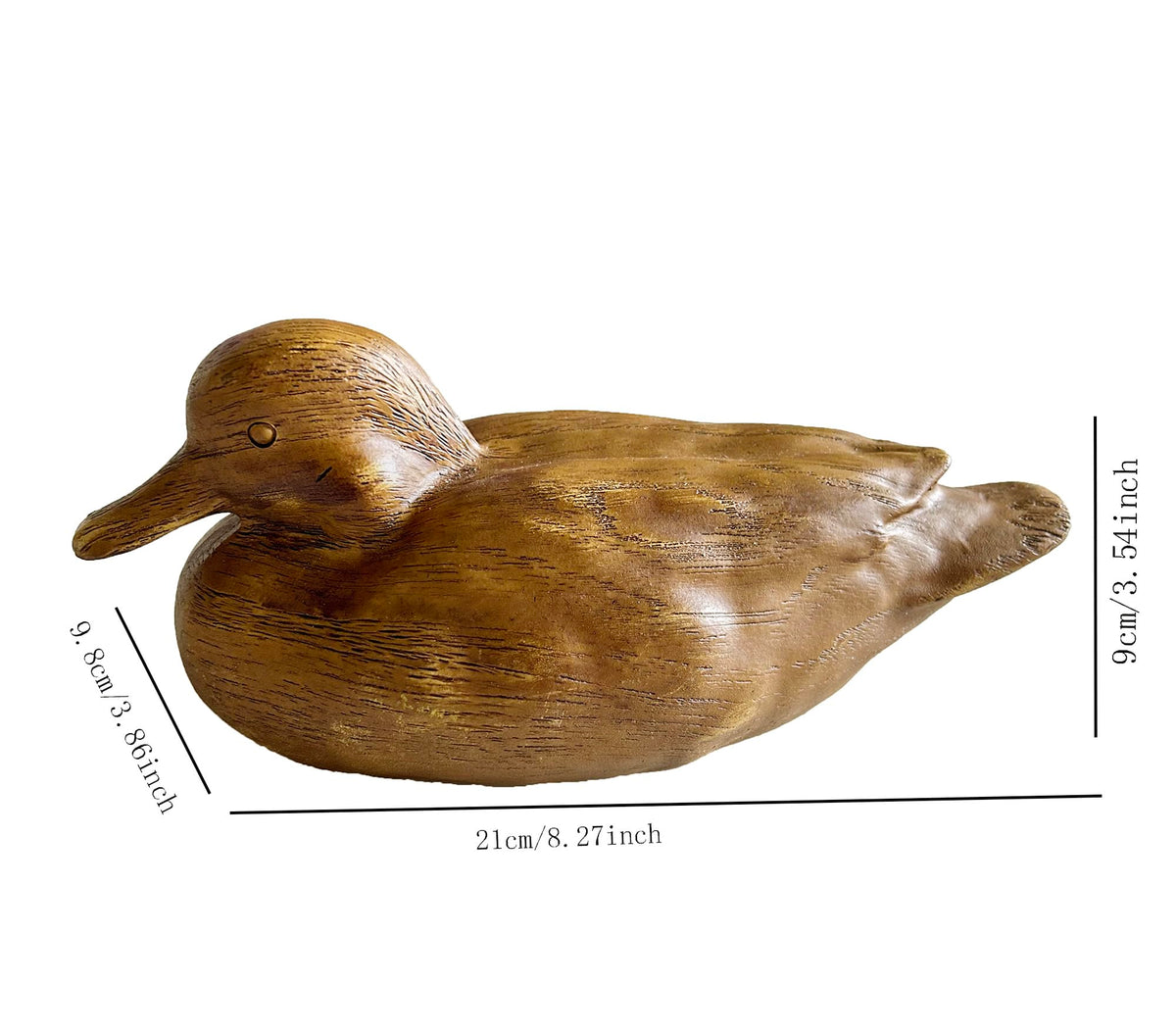Huitony duck figurine on desk adds a charming focal point to your workspace.