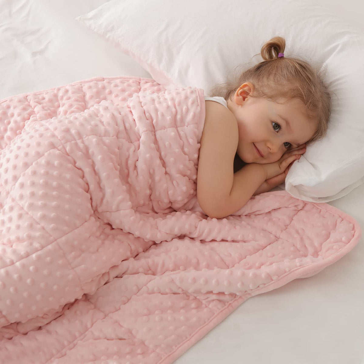 Huloo Sleep pink twin kids weighted blanket close-up in plush minky fabric