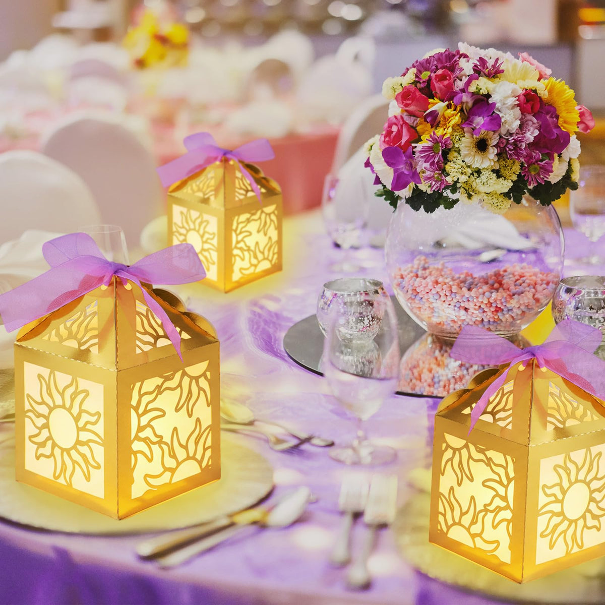 Humyoun folded paper box lanterns with candle slot offer subtle table lighting.