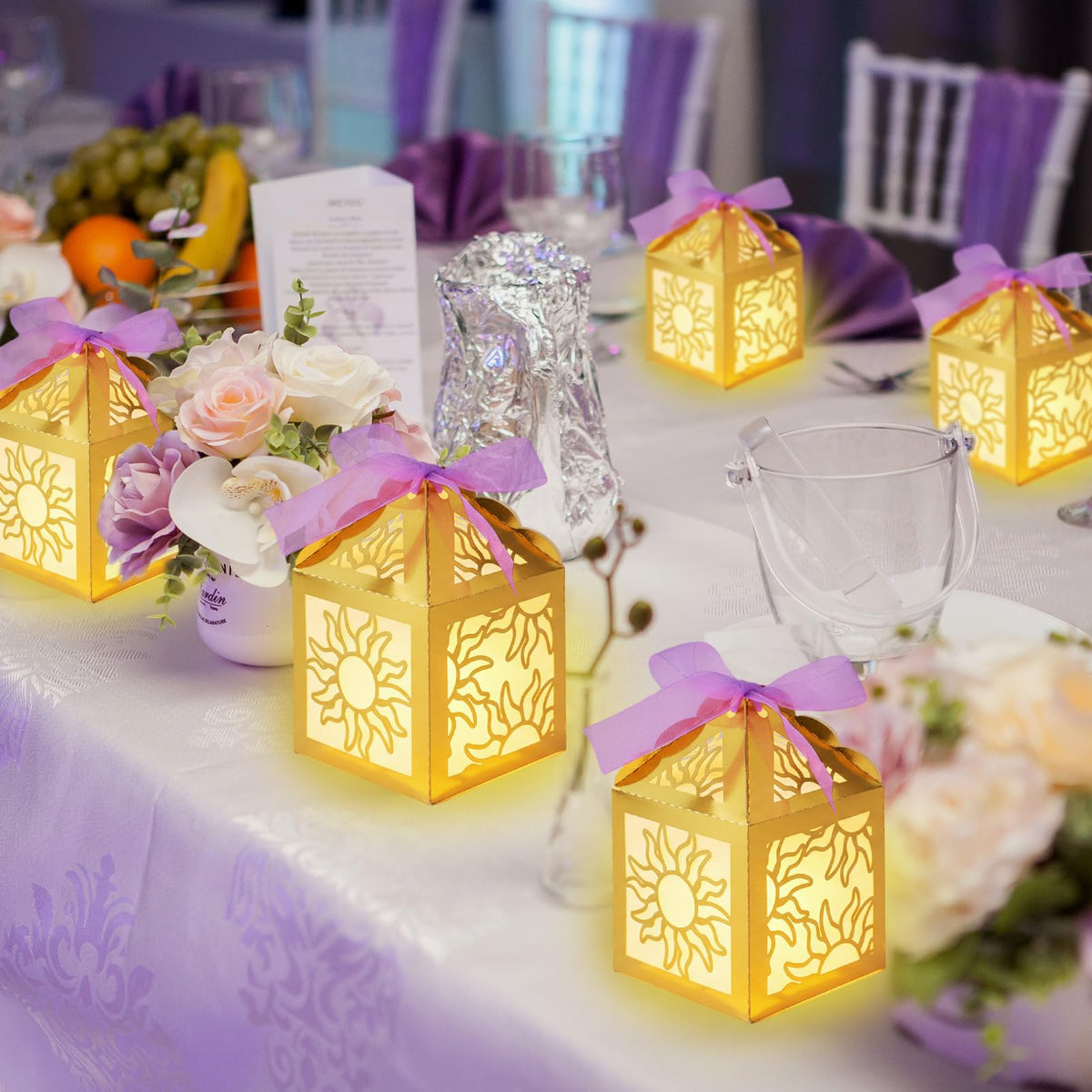 Humyoun sun pattern lanterns with gold cutouts create elegant decor glow.