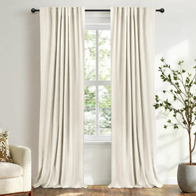 Hundred Percent Blackout Shield linen curtain blocks daylight for a darker bedroom.