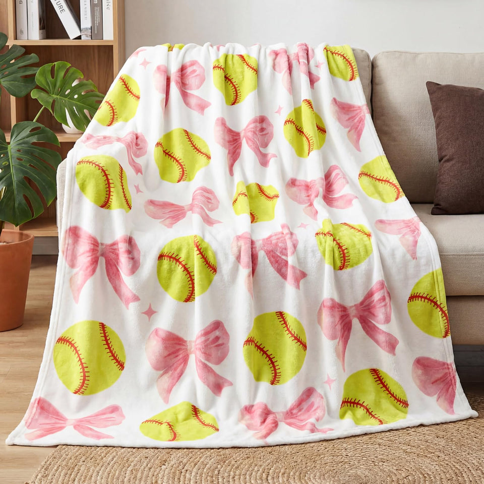 HunnmingRe softball blanket with coquette pink bow adds vibrant decor and warmth.