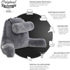 Husband Pillow XXL reading in bed demonstrates full-body support