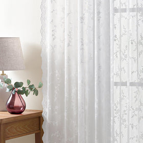 HushLoom living room setup showing breathable knit lace design.