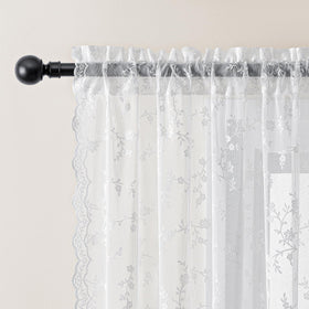 HushLoom bedroom setup with white lace curtains for airy ambience.