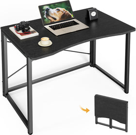 Huuger folding desk in compact space shows space saving for small rooms
