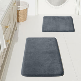 HUXMEYSON bath mat set memory foam close-up with plush foot support.