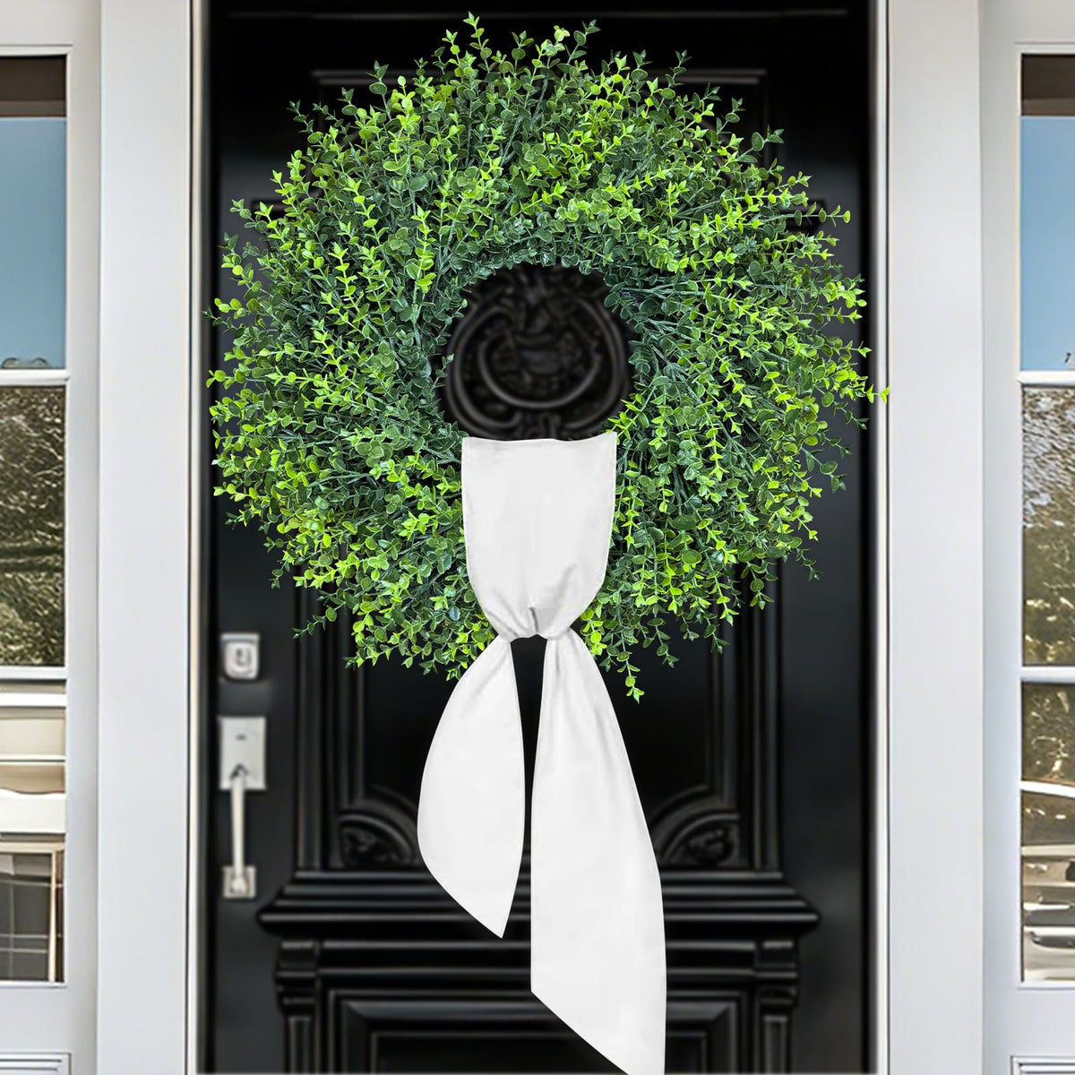 HUZIYAHAN boxwood wreath on wall provides natural accent for any room.