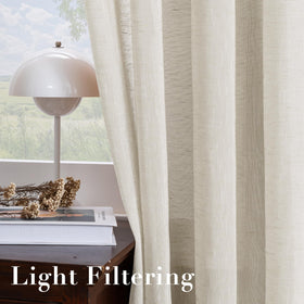 H.VERSAILTEX privacy-friendly window treatment with airy diffusion.