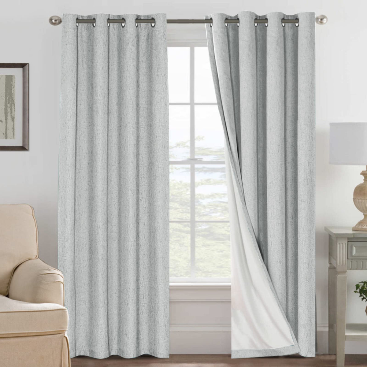 H.VERSAILTEX blackout curtains in glacier gray draped over a window for privacy