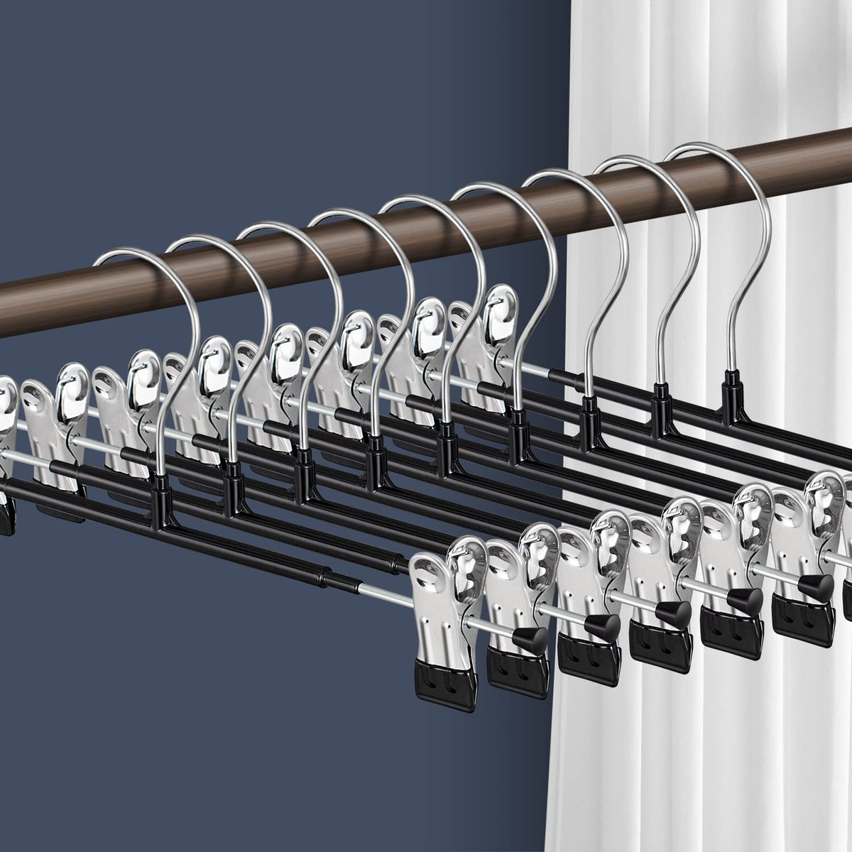 HWAJAN pants hangers with clips 20-pack offer sturdy support for pants and skirts.