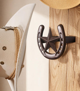 HYDERMUS wall hat hanger size approx 4.9x4.8x3.9 inches for compact spaces.