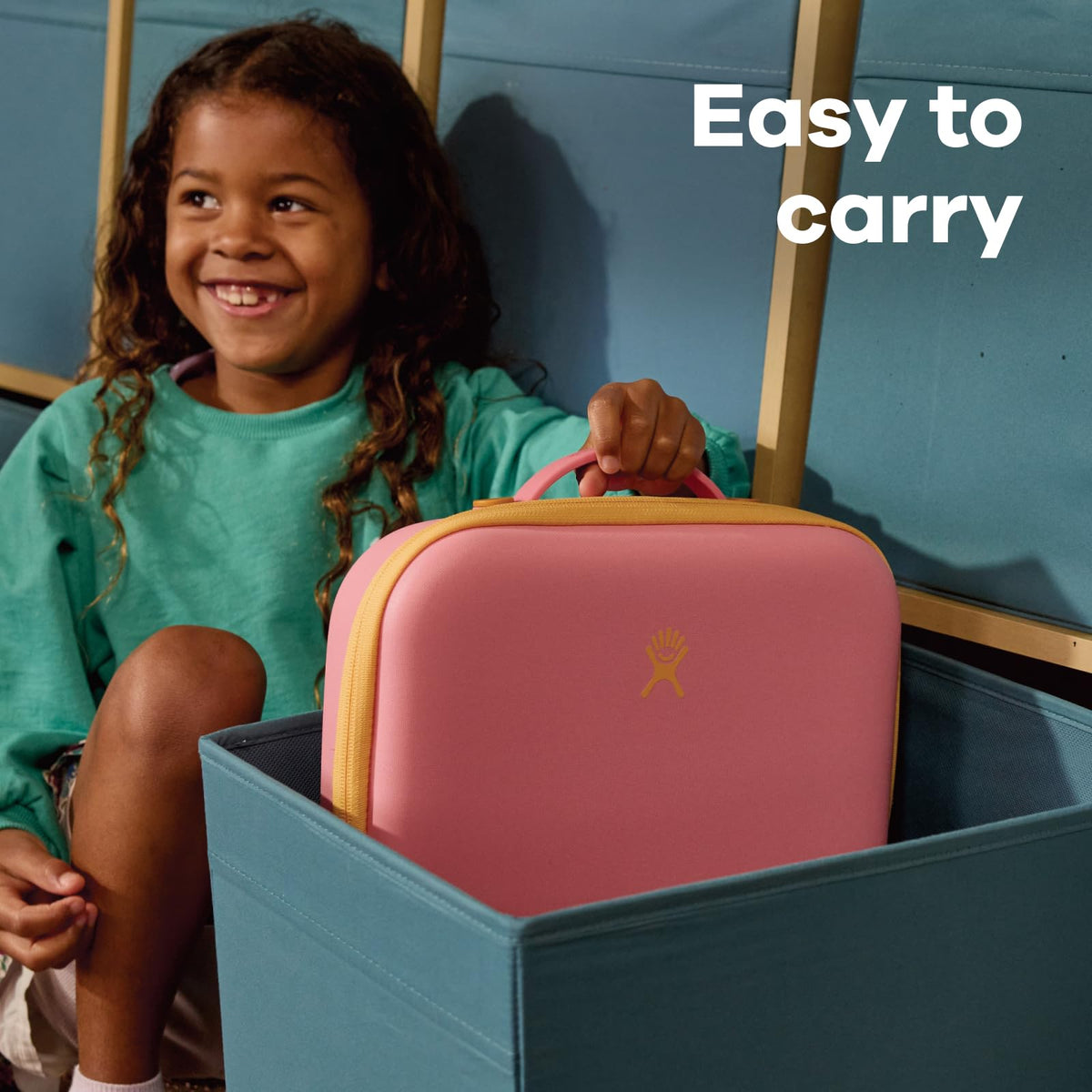 Hydro Flask lunch box fits neatly inside a backpack for daily use.