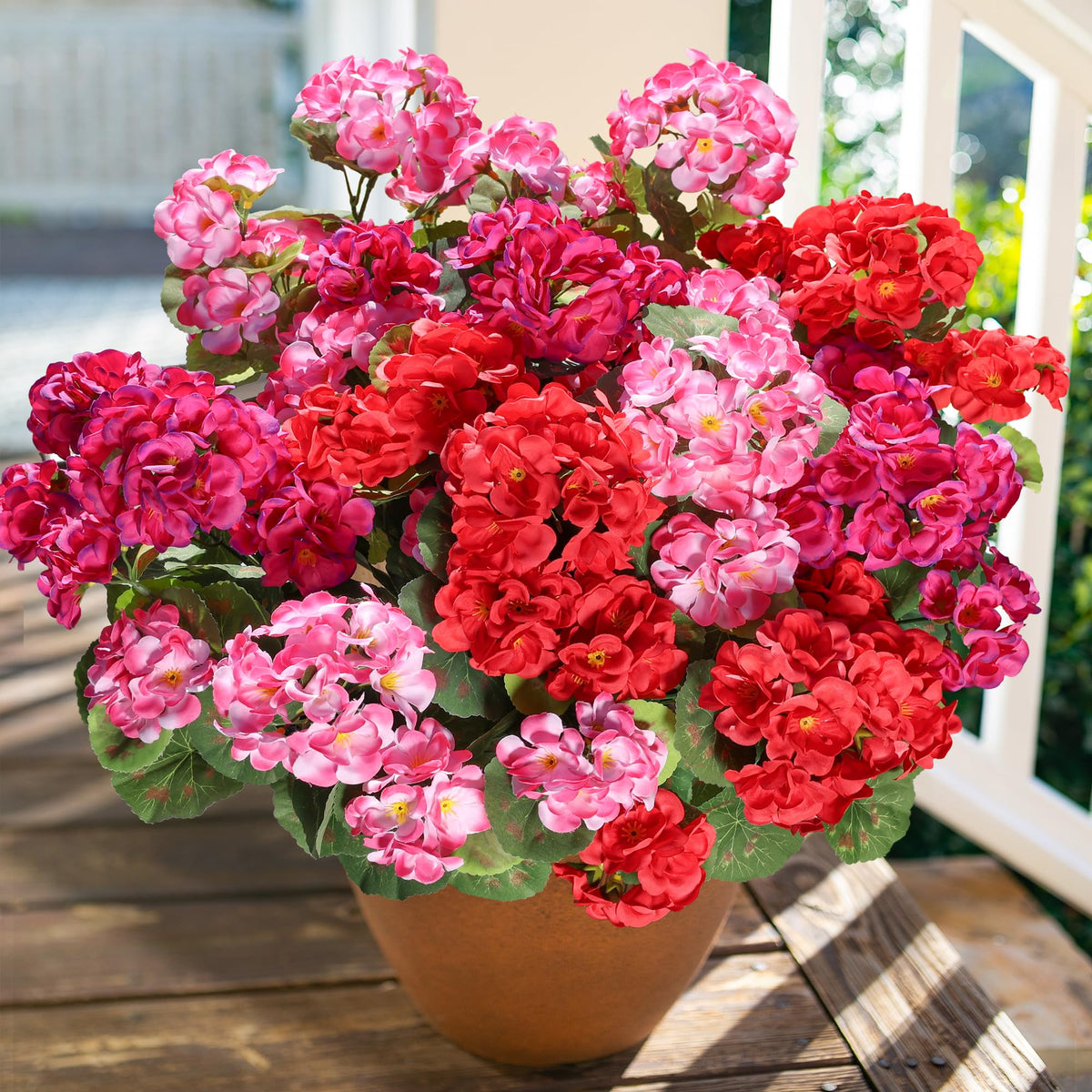 HyeFlora artificial geraniums create bright yard scenes with easy upkeep.