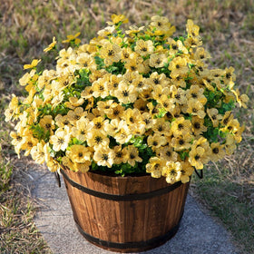 HyeFlora yellow artificial mums with eucalyptus leaves brighten porches and window boxes.