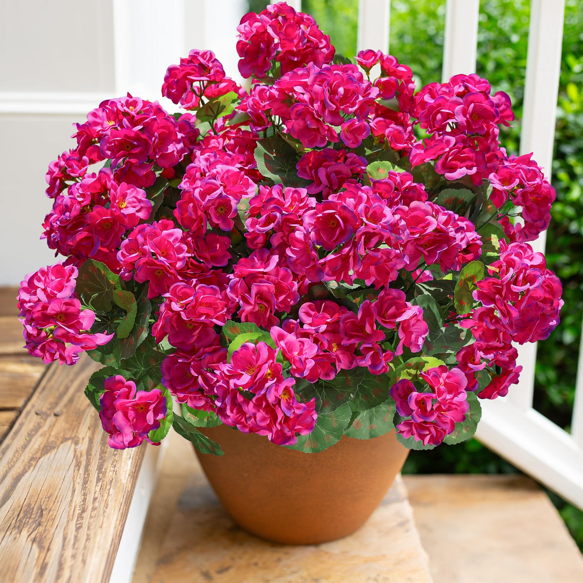 HyeFlora outdoor artificial geranium planters with fuchsia blooms boost curb appeal.
