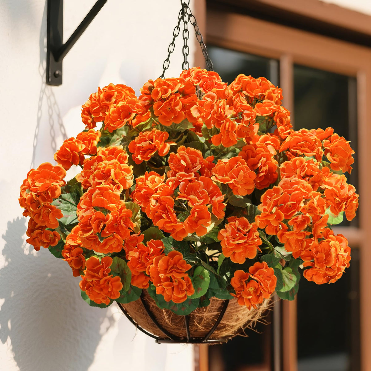 HyeFlora balcony edge adorned with orange faux geraniums