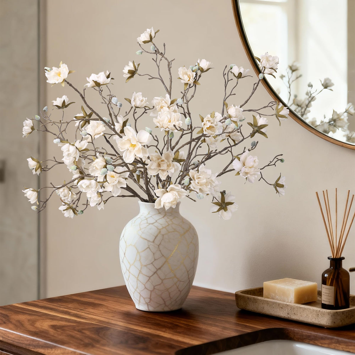 Hyeflora artificial magnolia branches with buds mimic fresh flowers.