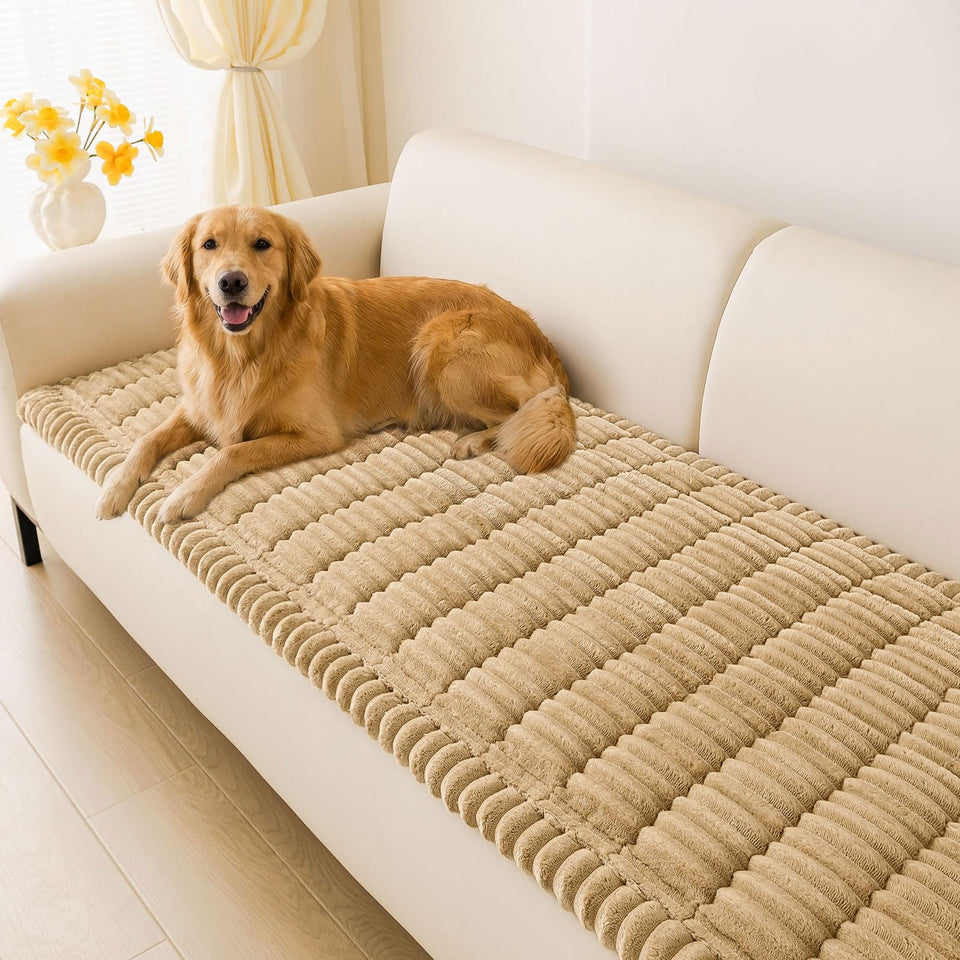 hyha couch cover with non-slip bottom protects the camel sofa and stays in place.