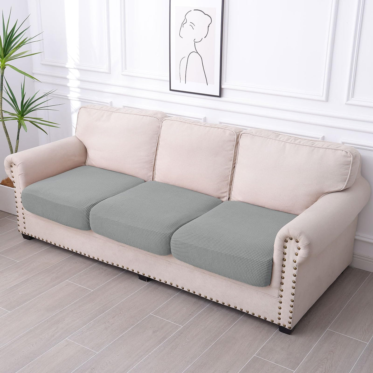 Hyha light grey sofa slipcover complements modern decor.