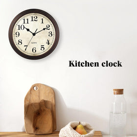 HYLANDA bronze wall clock in a cozy living room setup