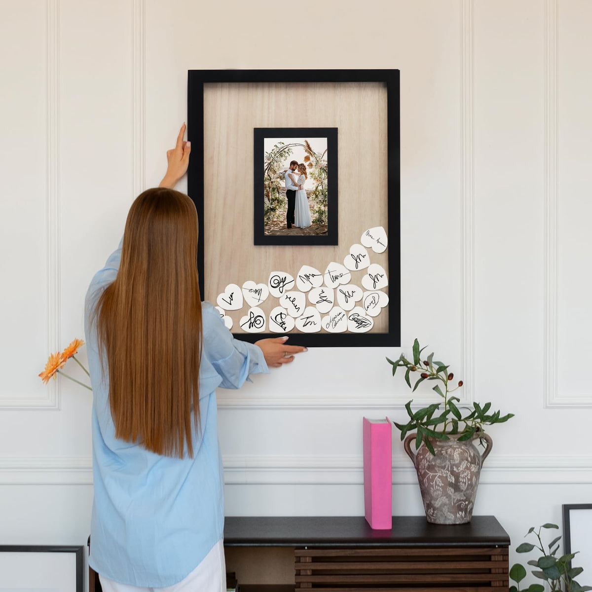 HYMENEX wooden stand provides a stable display.