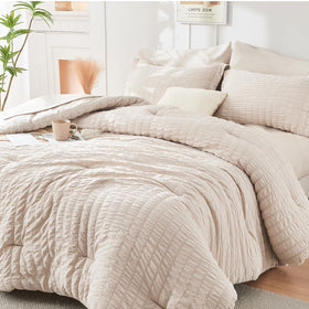 HYMOKEGE beige queen seersucker comforter on bed for cozy all-season sleep