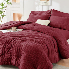 HYMOKEGE Burgundy Queen comforter close-up highlights seersucker texture.