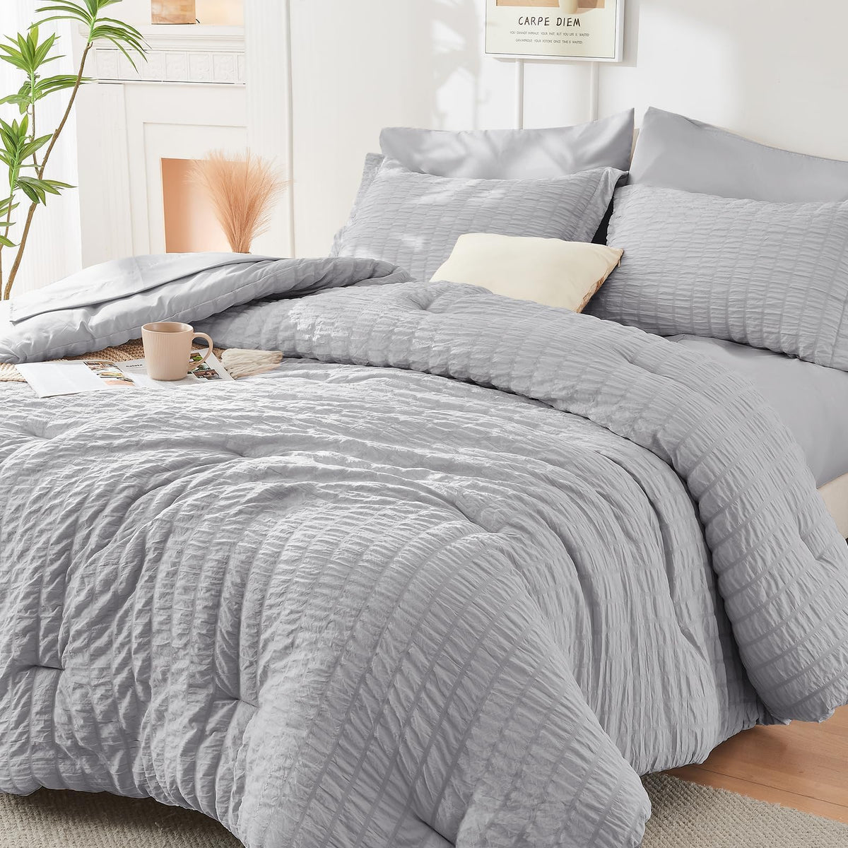 HYMOKEGE light-grey seersucker comforter closeup texture showcasing breathable, wrinkle-resistant fabric.