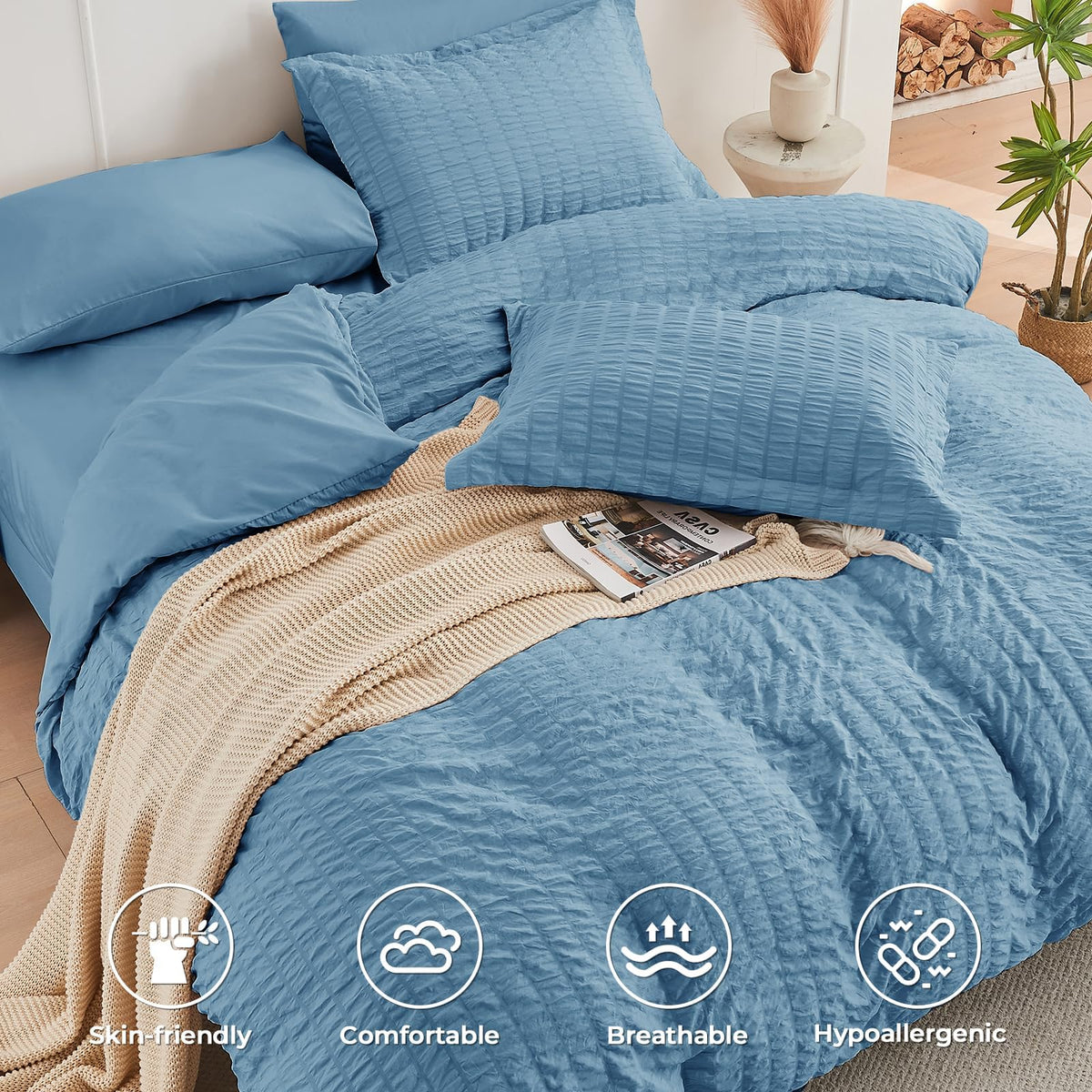 HYMOKEGE Mineral Blue queen bed with pillow shams, elegant bedroom styling.